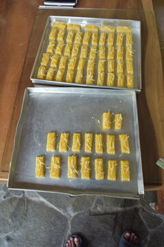 Top view of crunchy Kaastengels cookies home made. Dutch influenced Indonesian cookies, popular during Eid Al Fitr in Indonesia