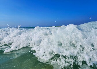 waves crashing on the beach