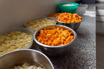 potatoes and pumpkins on counter