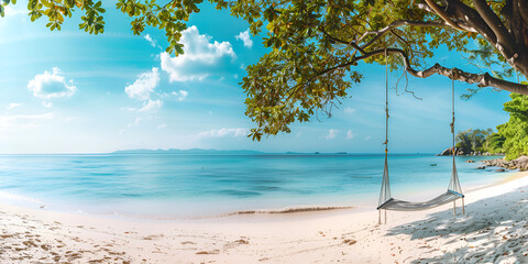 A swing on a tropical beach with a palm tree on the beach