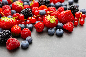 Berries. Various colorful berries Strawberry, Raspberry, Blackberry, Blueberry close-up Bio Fruits,...