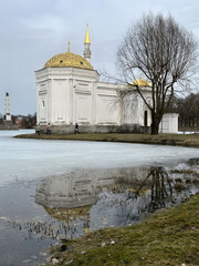 Large White Building With Golden Dome