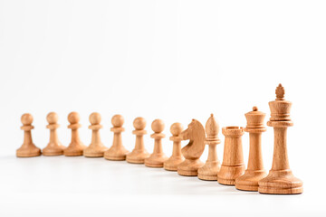 Beautiful chess pieces on white background. Business concept and decision strategies.