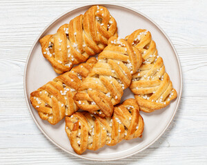 passion fruit puff pastry turnovers on a plate