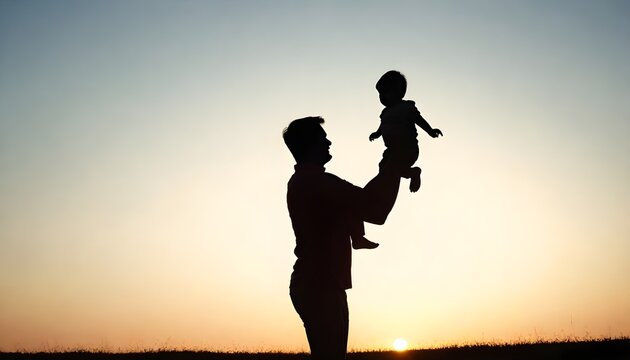 father and son in the park. father day silhouette happy family child dream concept. father carries his son on his back. dad playing with his son in nature in the park silhouette at sunset lifestyle