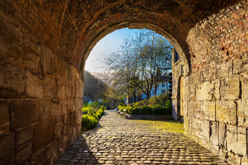 Looking out of a short tunnel underneath the Iron Bridge in Ironbridge, Shropshire, UK the World...