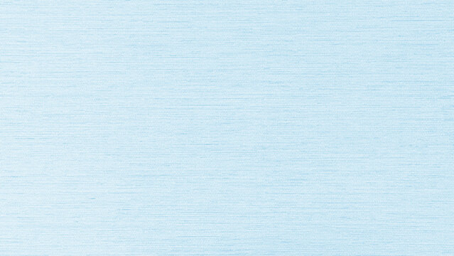 Light blue fabric background of satin silk wallpaer texture cotton canvas linen cloth pattern