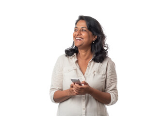 South Asian Woman Holding Phone Smiling