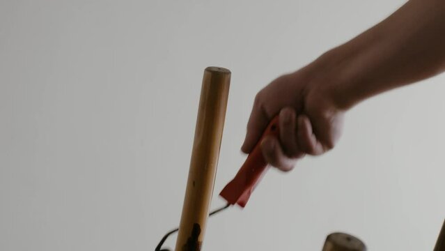 Restoration of a wooden chair. Covering with dark varnish. Close-up. Vintage things. High quality 4k footage