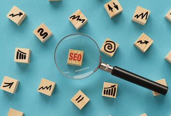 Cubes with the acronym SEO for search engine optimization concept.