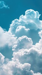 Naklejka na ściany i meble Vibrant Blue Sky Adorned with Fluffy White Clouds