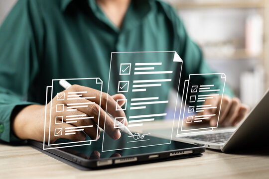 Electronic signature concept, E-signing, Business man using stylus pen signing contract electronic document on laptop, Document management, Sign agreement, E-documents for paperless transactions.
