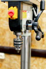 close-up At the service station of beautiful iron machine for strong fixation of spare parts