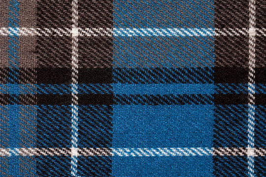 Tartan pattern wool fabric in blue brown and white