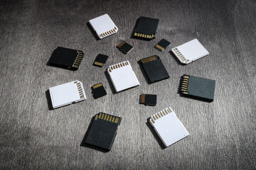 SD and microSD memory cards on a dark wooden background