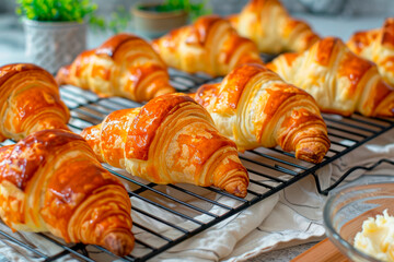 freshly baked croissants on baking pan - 781436211