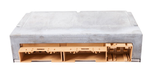 Plastic car engine control unit with metal elements on a white isolated background is the...