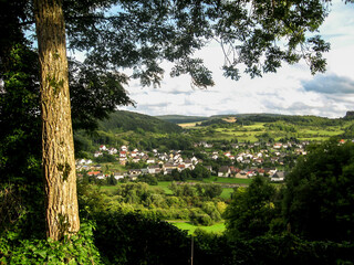 View over a German Town in the mountains of Vulcaneifel Geopark in the Eifel region of Germany.