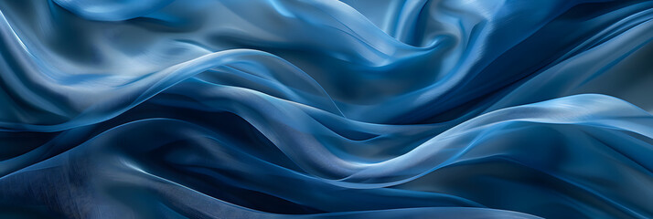 Fototapeta premium A close up of a fluid, electric blue silk cloth with a mesmerizing wind wave pattern, resembling the fluidity and movement of water