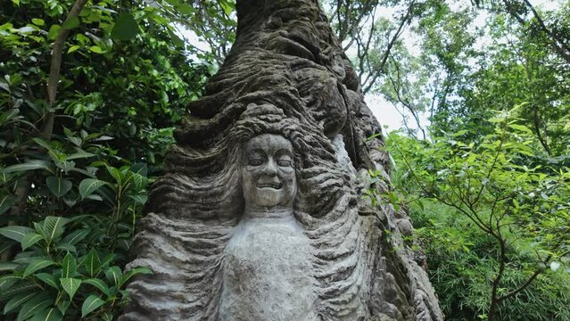 Statue in the Monkey Forest. Ubud, Bali, Indonesia.