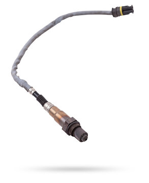 Lambda probe - oxygen sensor device designed to record tamount of remaining oxygen in the exhaust gas of car engine is located in exhaust system. Metal spare part for replacement to repair in workshop