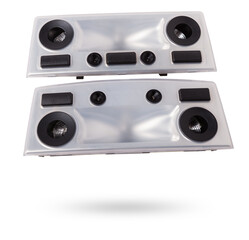 Obraz premium A transparent plastic shade for illuminating the interior on a white isolated background in a photo studio - spare parts for repairing a car interior or for sale in a auto service.