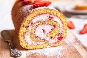 Swiss roll with strawberries and cream, homemde dessert - 781462213