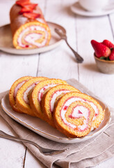 Swiss roll with strawberries and cream, homemde dessert - 781462649