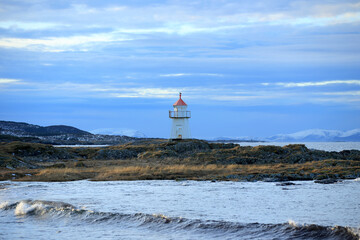 Fototapeta na wymiar Lighthouse at Vigra island, Norway.