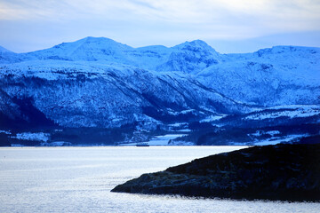 View at the mountains from the Atlantic Ocean Road in winter ( Norway). - 781468416