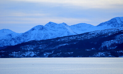View at the mountains from the Atlantic Ocean Road in winter (Norway). - 781468421