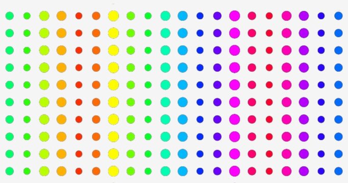 Artistic rainbow colored dots arranged on a white background. pattern with circles.