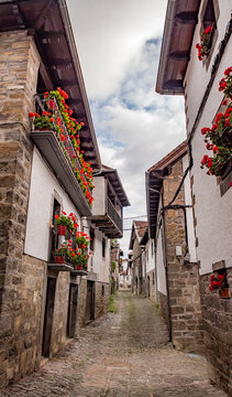 Ochagavía (Otsagabia), Navarra, Spain - October 16, 2023: Narrow street in the historic centre
