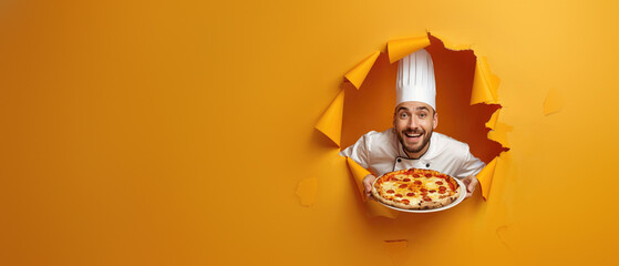 An excited chef in white uniform popping out through a yellow paper tear, holding a freshly baked pizza
