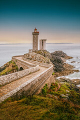 The lighthouse of Petit Minou, located on the coast of the Iroise Sea, is a maritime icon and a historical monument of Brittany. In Plouzane, Brittany, France - 781481482