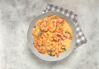 shrimp in creamy garlic sauce, with spices and herbs,