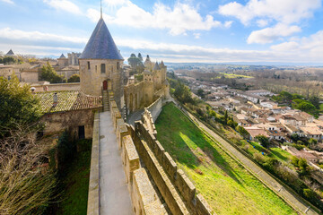 View of the newer city of Carcassonne, France, from the walled ramparts of the Château Comtal castle, in the medieval walled La Cite' inside the castle walls.