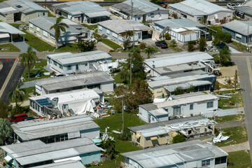 Aerial view of natural disaster consequences in Florida Southwest region. Severely damaged by...