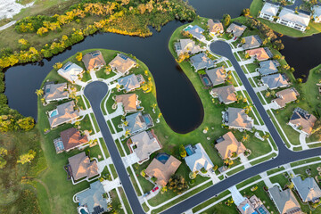 Aerial view of spacious family houses in Florida suburban area. Real estate development in American suburbs