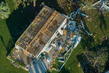 Strong hurricane winds severely damaged private houses in Florida mobile home residential area....