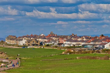 View of fields , sea and city of morecambe
