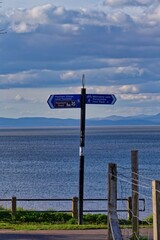 signpost on the coast in Heysham
