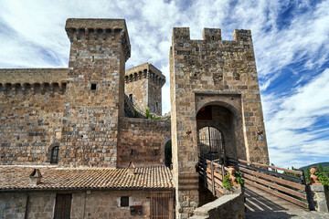 medieval bridge, gate and stone towers in the town of Bolsena
