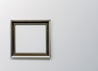 silver picture frame on a white wall