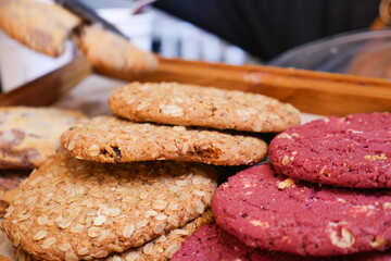 Many different cookies on trays display bakery cafe