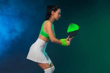 Pickleball tennis player with racket and ball at open tour. Sports woman at the court. Social media template - 781511829