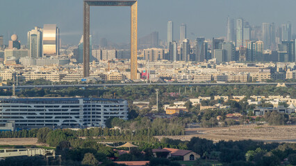Skyline view of Deira and Sharjah districts in Dubai timelapse before sunset, UAE.