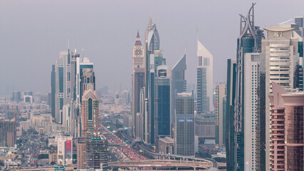 Aerial view to skyscrapers on Dubai downtown and Sheikh Zayed road day to night timelapse, Dubai, United Arab Emirates