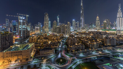Dubai Downtown skyline night timelapse with Burj Khalifa and other towers panoramic view from the...