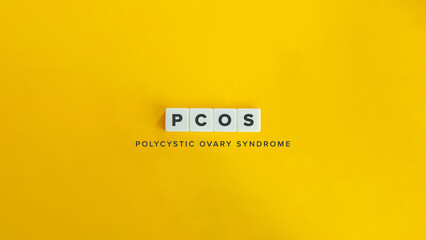 PCOS, Polycystic Ovary Syndrome. Text on Block Letter Tiles and Icon on Flat Background. Minimalist Aesthetics.